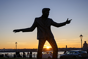 The bronze statue of English Rock and Roll singer Billy Fury, erected by the River Mersey in Liverpool
