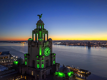The Liverbird at night with sunset view of the river Mersey, Liverpool