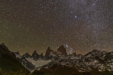 Mount Fitz Roy and Cerro Torre at night with star trails, El Chalten, Patagonia, Argentina, South America