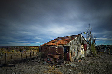 Old shed set against open landscape in Patagonia, Argentina, South America