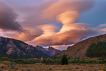 Lenticular clouds above The Chilean Saddle, Bariloche, Patagonia, Argentina, South America