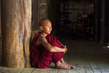 Young Buddhist monk at temple, Bagan (Pagan), Myanmar (Burma), Asia