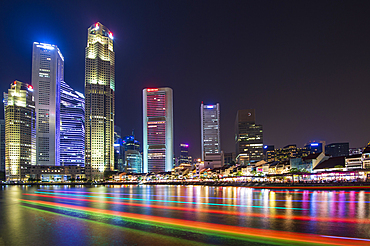 Clarke Quay with boat light trails at night, Singapore, Southeast Asia, Asia