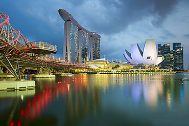 The Helix Bridge and Marina Bay Sands hotel at night, Singapore, Southeast Asia, Asia