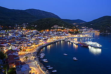 The elevated view of Parga town at night, Parga, Preveza, Greece, Europe