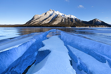 Ice formations with Mount Michener in the background at sunrise, Abraham Lake, Kootenay Plains, Alberta, Canadian Rockies, Canada, North America