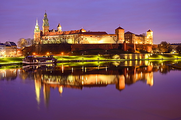 Wawel Castle, UNESCO World Heritage Site, reflected in Vistula River, at night, Krakow, Poland, Europe