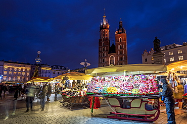 Christmas markets at night with Saint Mary's Basilica, Market Square, UNESCO World Heritage Site, Krakow, Poland, Europe