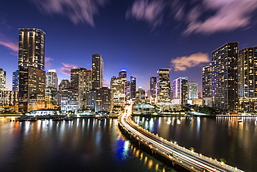 Bridge leading to Brickell Key and Downtown Miami skyline at night, Florida, United States of America, North America