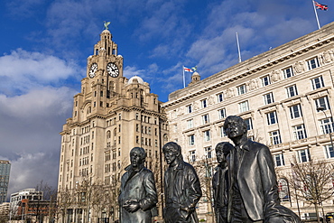 Bronze statue of the four Liverpool Beatles stands on Liverpool Waterfront, Liverpool, Merseyside, England, United Kingdom, Europe