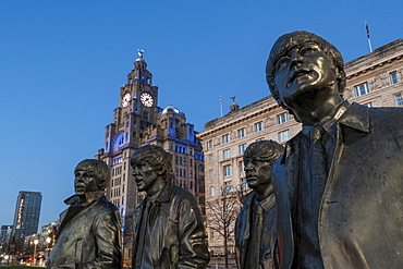 The Beatles statue at night, Liverpool waterfront, Liverpool, Merseyside, England, United Kingdom, Europe