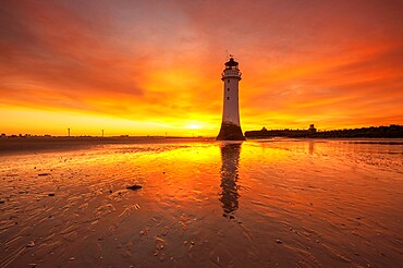 Perch Rock Lighthouse with dramatic sunrise, New Brighton, Cheshire, England, United Kingdom, Europe