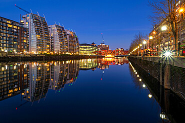 NV Apartments and The Detroit Swing Bridge at night, Huron Basin, Salford Quays, Greater Manchester, England, United Kingdom, Europe