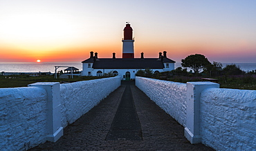 Sunrise behind Souter Lighthouse, Marsden, South Shields, Tyne and Wear, England, United Kingdom, Europe