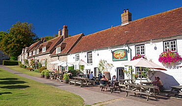 The 16th century Tiger Inn beside the village green, East Dean, South Downs National Park, East Sussex, England, United Kingdom, Europe