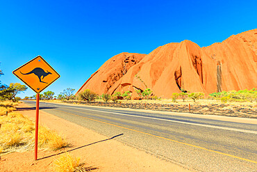 Kangaroo crossing warning sign along Ayers Rock drive in Uluru-Kata Tjuta National Park, UNESCO World Heritage Site, Northern Territory, Australia, Pacific