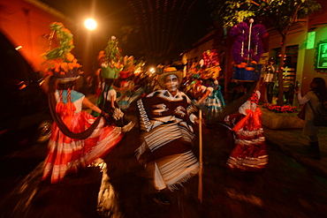 People participating in comparsas (street dances) during the Day of The Dead Celebration, Oaxaca City, Oaxaca, Mexico, North America