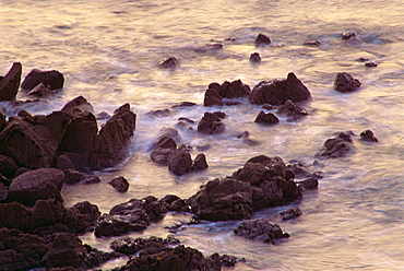 Sea breaking against rocks on the coast at Coverack, Cornwall, England, United Kingdom, Europe