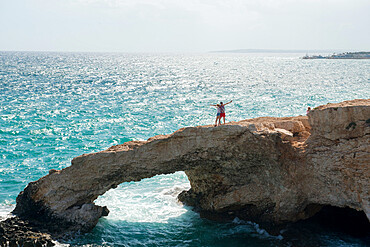 Tourists taking selfies on Monachus Monachus Arch Protaras, Cyprus, Mediterranean, Europe