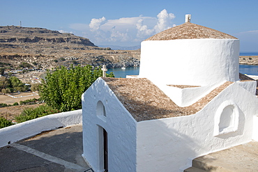 Church overlooking Lindos Beach, Lindos, Rhodes, Dodecanese, Greek Islands, Greece, Europe