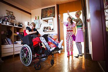 Two clowns from the Hopiclowns association, perform in a home for disabled adults in Geneva, Switzerland.