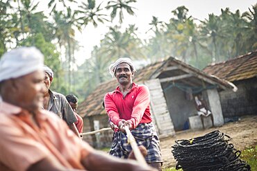 Fishermen at Kappil Beach, Varkala, Kerala, India