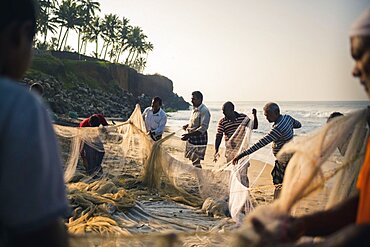 Fishermen at Kappil Beach, Varkala, Kerala, India