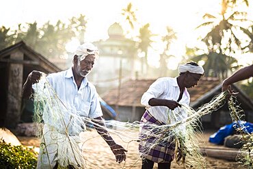 Fishermen at Kappil Beach, Varkala, Kerala, India