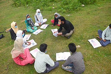 Students attending their open air classes at Doodhpathri in Budgam district, Kashmir, India.