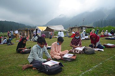 Students attending their open air classes at Doodhpathri in Budgam district, Kashmir, India.