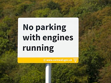 No parking with engines running sign at West Looe Car Park, Looe, Cornwall, UK