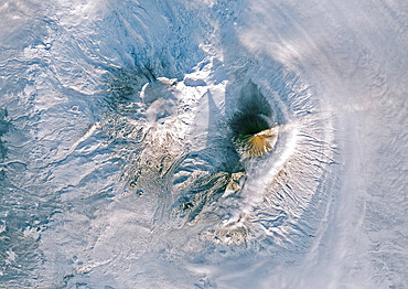 Color satellite image of Volcanoes on Kamchatka Peninsula, Russia. Klyuchevskaya, to the right, the tallest and most active volcano on the peninsula