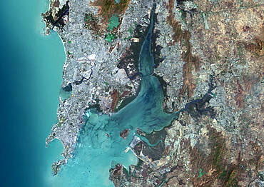 Color satellite image of Mumbai and Navi Mumbai, India. Navi Mumbai is a planned township located East of Mumbai. Both cities are connected by the Vashi bridge, also called Thane Creek Bridge