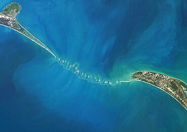 Satellite view of Adam's Bridge. This chain of limestone shoals connects Sri Lanka to India. This image was taken in 2014 by Landsat 8 satellite.