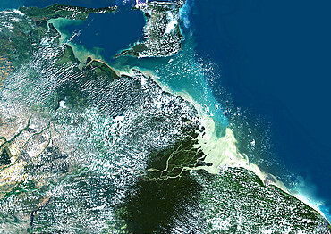 Orinoco Delta, Venezuela, True Colour Satellite Image. True colour satellite image of the Orinoco Delta in eastern Venezuela, The Orinoco river flows into the Atlantic ocean. At top is the island of Trinidad in the Caribbean sea. Composite image using LANDSAT 5 data.