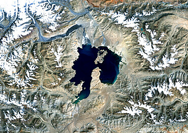 Kara-Kul Meteor Impact Crater, Tajikistan, True Colour Satellite Image. True colour satellite image of Kara-Kul impact structure, Tajikistan (age : 25 million years ; diameter : 52 km). Image taken on 27 September 1992 using LANDSAT data.