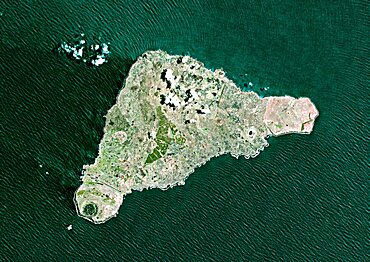 Easter Island, Chile, True Colour Satellite Image. Satellite image of Easter Island or Rapa Nui, territory of Chile, is an isolated island in the South Pacific ocean, West of Chile.The image used LANDSAT data.