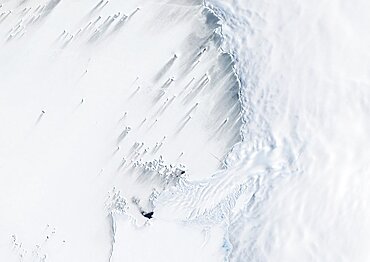 Pine Island Bay, Amundsen Sea, Antarctica, True Colour Satellite Image. True colour satellite of Pine Island Bay in the Amundsen Sea.The blakek mark crossing the image shows the limit between the indlansis of the Wallgreen coast and Pine Island Bay in Amundsen Sea, in the Western part of Antarctica. Image taken on 13 January 2001 using LANDSAT data.