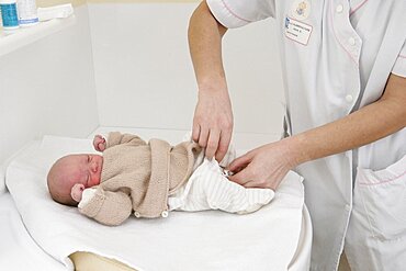 Maternity Ward, Nurse with Newborn