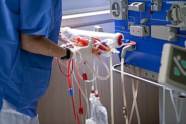 Nurse with Hemodialysis Equipment