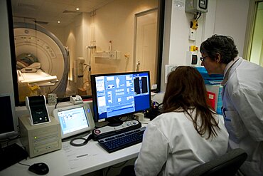 Technician Taking MRI of Arm after Doppler