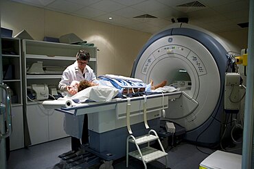 Technician Taking MRI of Arm after Doppler