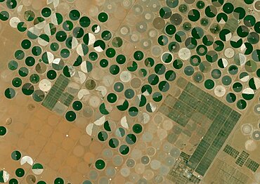 Color satellite image of crop circles in the desert in the Wadi As-Sirhan Basin, in Northern Saudi Arabia. Image collected on July 08, 2020 by Sentinel-2 satellites.