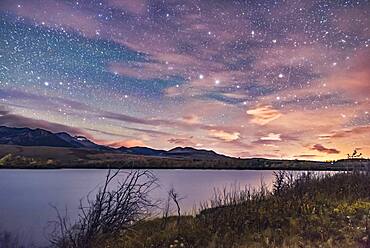 The Big Dipper in hazy clouds over the Waterton River at Maskinonge Pond, September 23, 2016, taken at the Night Photography Workshop I conducted there that night. The glow at right is light pollution from the Shell Waterton Gas Plant and from Pincher Creek to the north.