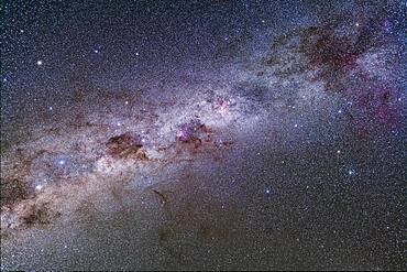 Splendours of the southern Milky Way from Vela (at top right) to Centaurus (at bottom left), including the Carina Nebula, Crux and Coal Sack, and Alpha and Beta Centauri. A part of the huge Gum Nebula is at far right. The False Cross is at right, with the large cluster NGC 2516, the Diamond Cluster, below it. The globular cluster Omega Centauri is at upper left.