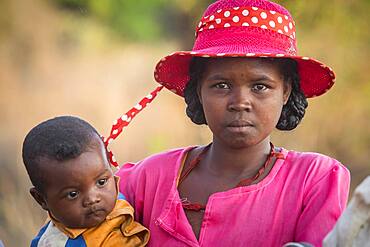 Portrait of Malagasy mother and son, surroundings of Manja village, Madagascar