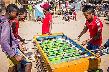 Playing table football, Ambohimahasoa city, Madagascar