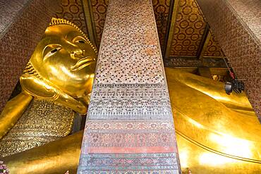 Golden big Buddha, in Wat Pho or Wat Phra Nakhon temple in Bangkok, Thailand