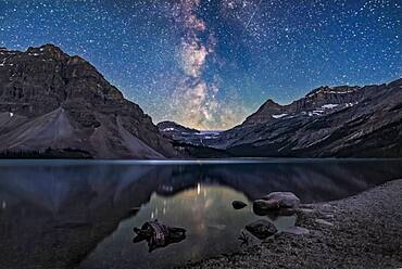 The galactic centre region of the Milky Way in Sagittarius setting behind Bow Glacier at the end of Bow Lake, in Banff National Park, Alberta.