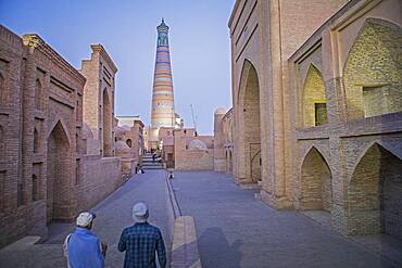 Islom Hoja Minaret. At right Sherghozi Khan Medressa. At left  Pahlavon Mahmud Mausoleum, Khiva, Uzbekistan